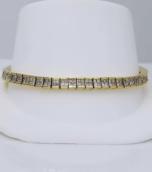 5 CT. T.W. PRINCESS CUT DIAMOND TENNIS BRACELET in 14K YELLOW GOLD