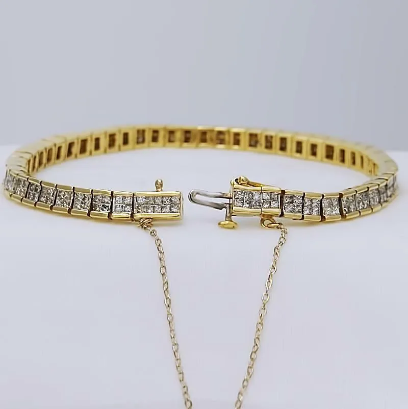 5 CT. T.W. PRINCESS CUT DIAMOND TENNIS BRACELET in 14K YELLOW GOLD