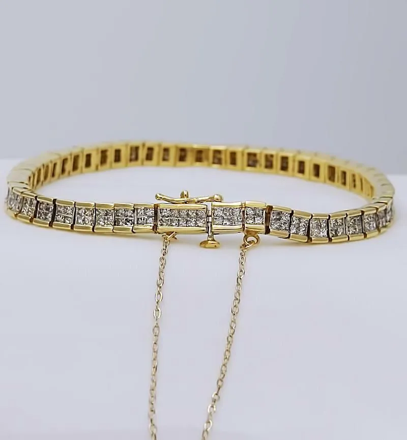 5 CT. T.W. PRINCESS CUT DIAMOND TENNIS BRACELET in 14K YELLOW GOLD