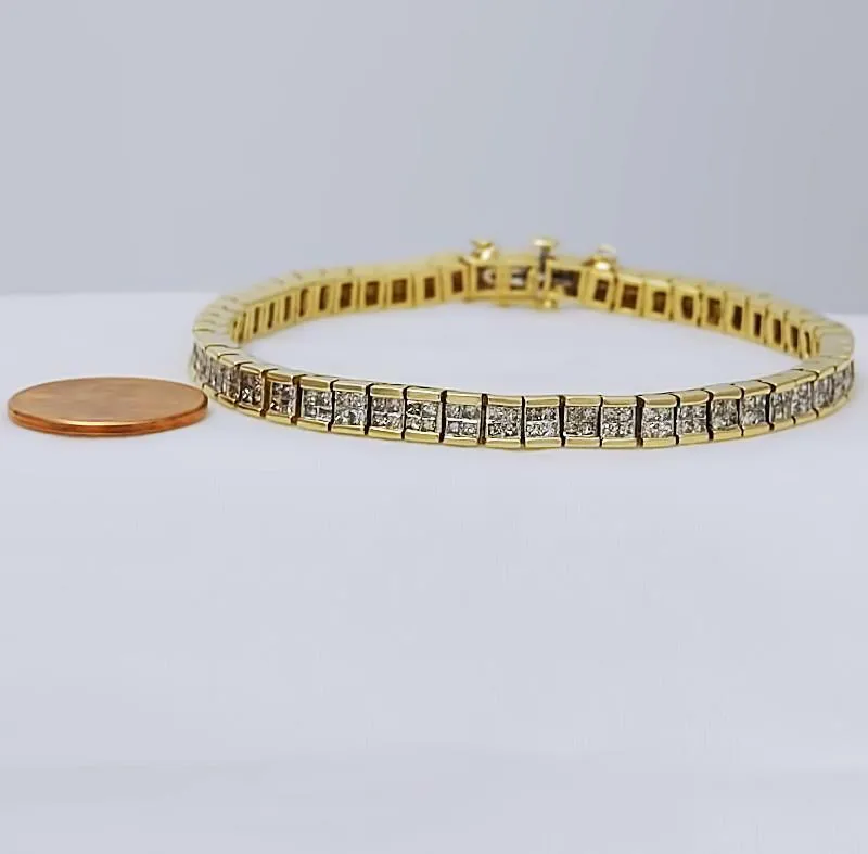 5 CT. T.W. PRINCESS CUT DIAMOND TENNIS BRACELET in 14K YELLOW GOLD