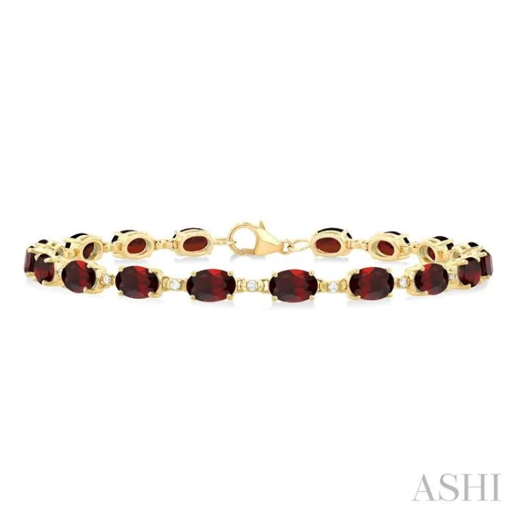 6X4 MM Oval Cut Garnet and 1/6 ctw Round Cut Diamond Semi Precious Tennis Bracelet in 10K Yellow Gold