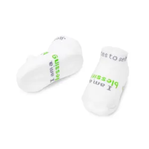 I am a blessing® white baby socks with green words (3-12 mo)