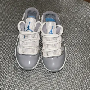 Jordan 11 Retro Low Cement Grey size 10c